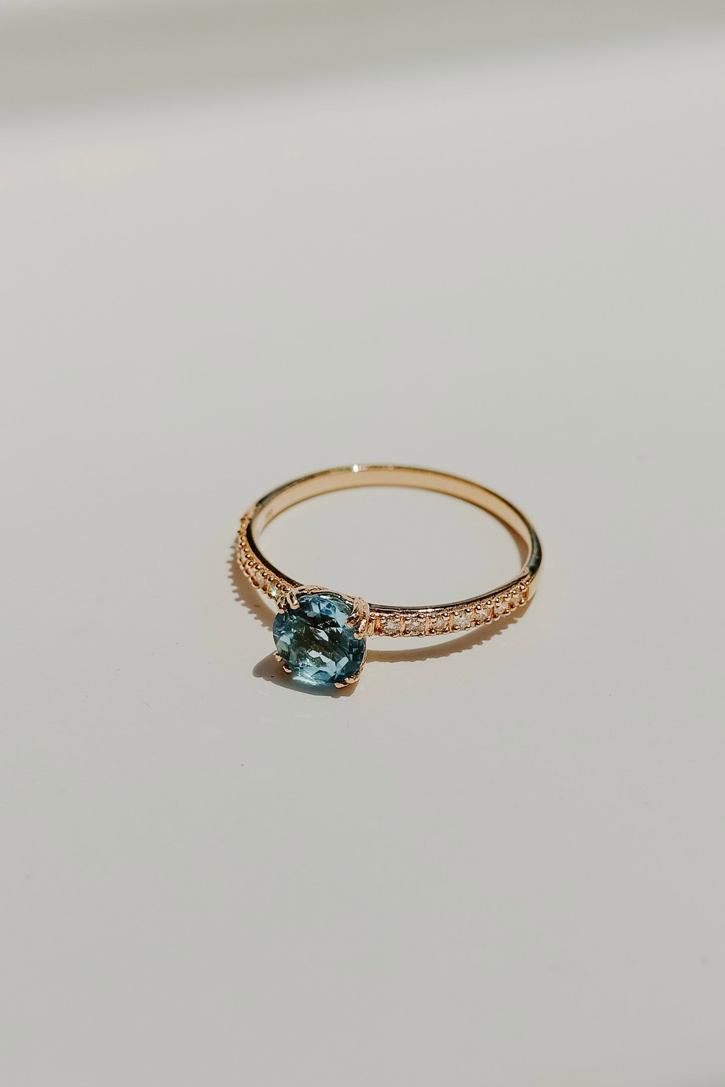 Katherine Stuart | Victoria Diamond Flanked Blue Topaz Ring
